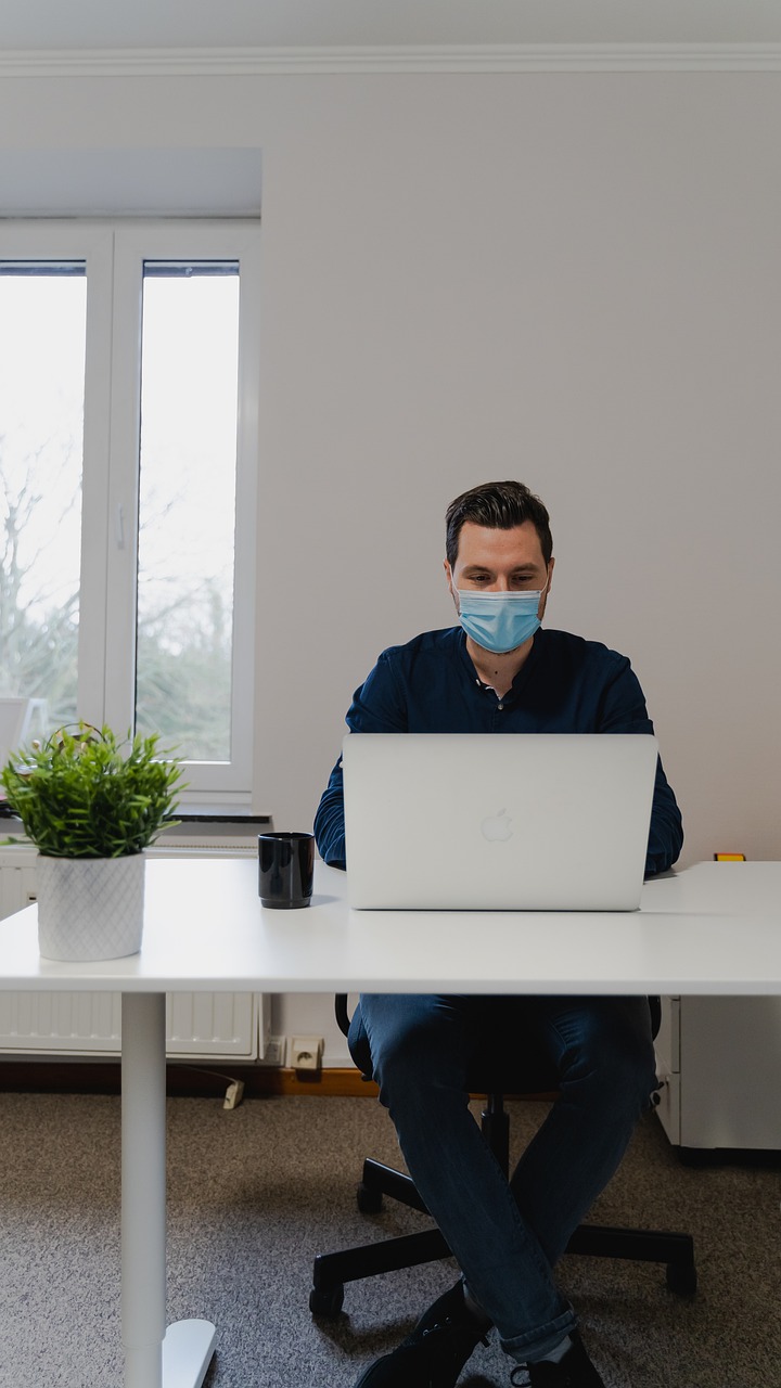 man, laptop, mask